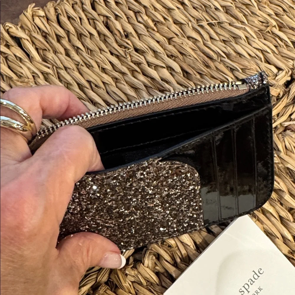 Kate Spade glitter clutch wristlet in gold and black